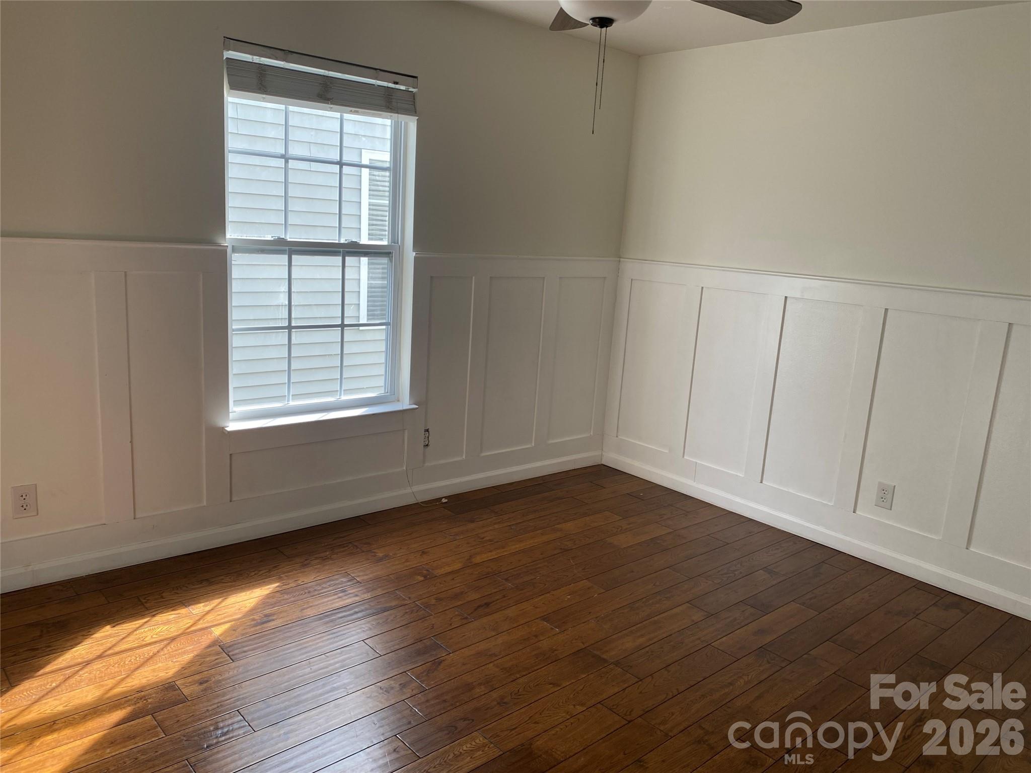 2054 Durand Road Fort Mill, SC 29715 - Photo 22 of 29 an empty room with wooden floor and windows