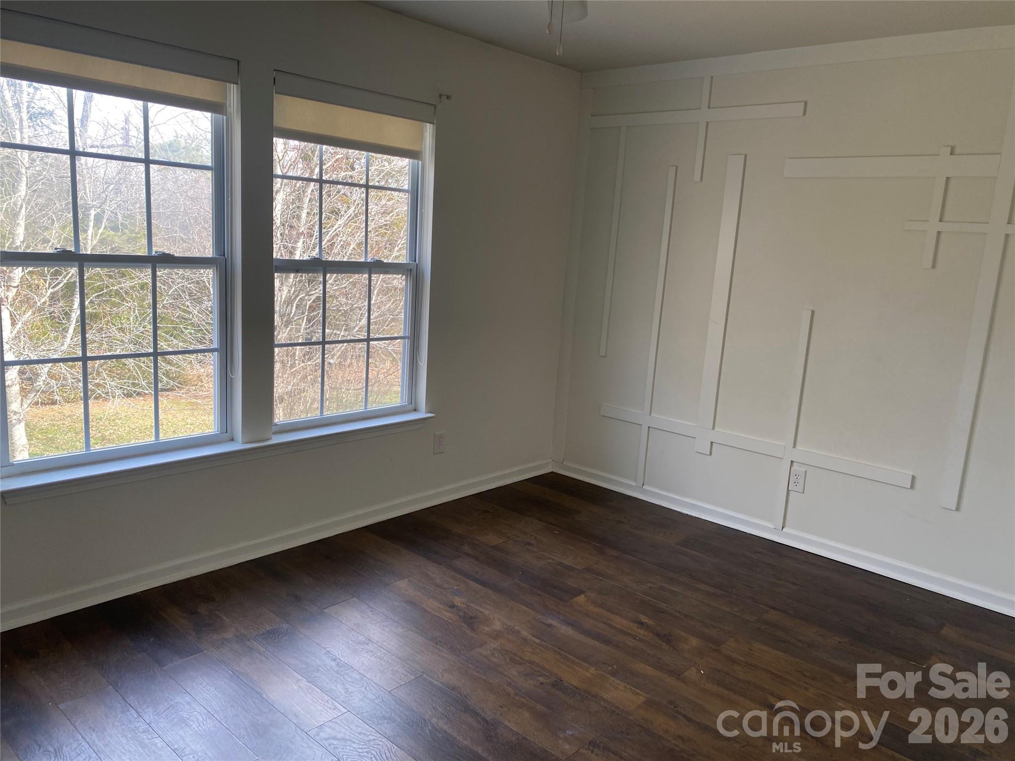 2054 Durand Road Fort Mill, SC 29715 - Photo 23 of 30 an empty room with wooden floor and windows