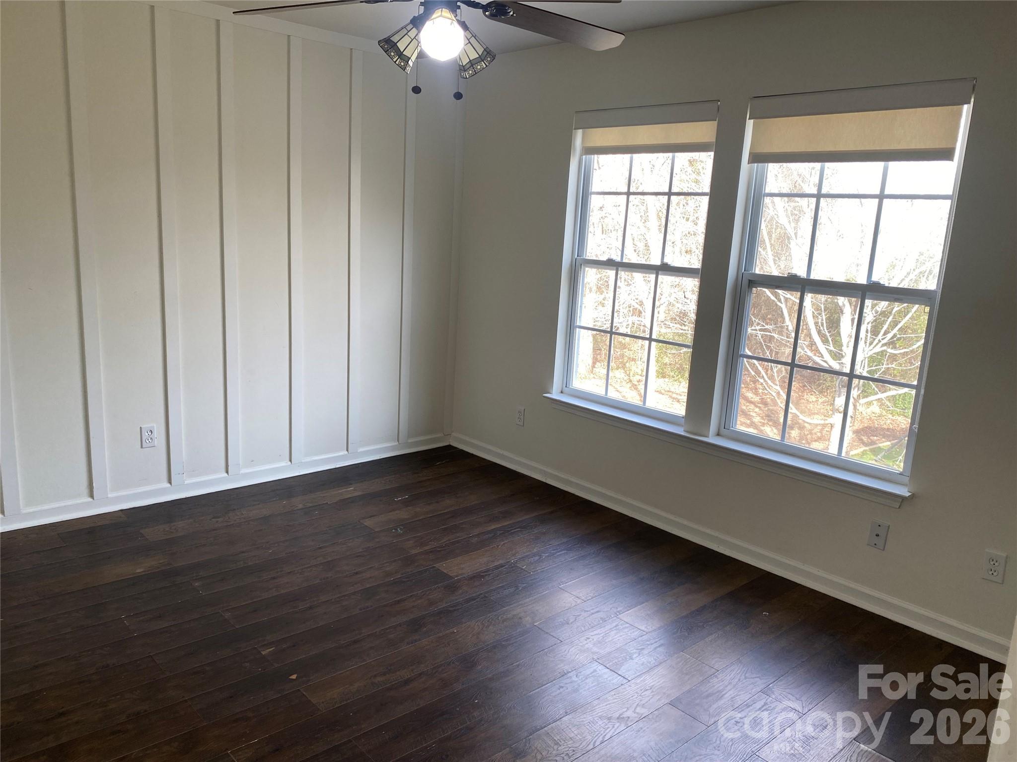 2054 Durand Road Fort Mill, SC 29715 - Photo 26 of 29 a view of an empty room with wooden floor and a window