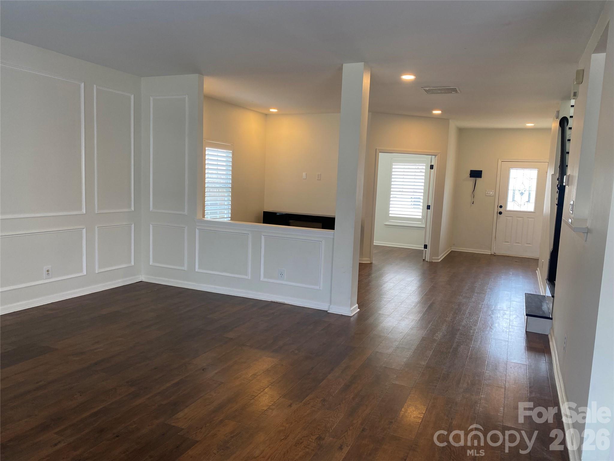 2054 Durand Road Fort Mill, SC 29715 - Photo 3 of 30 a view of a big room with wooden floor and windows