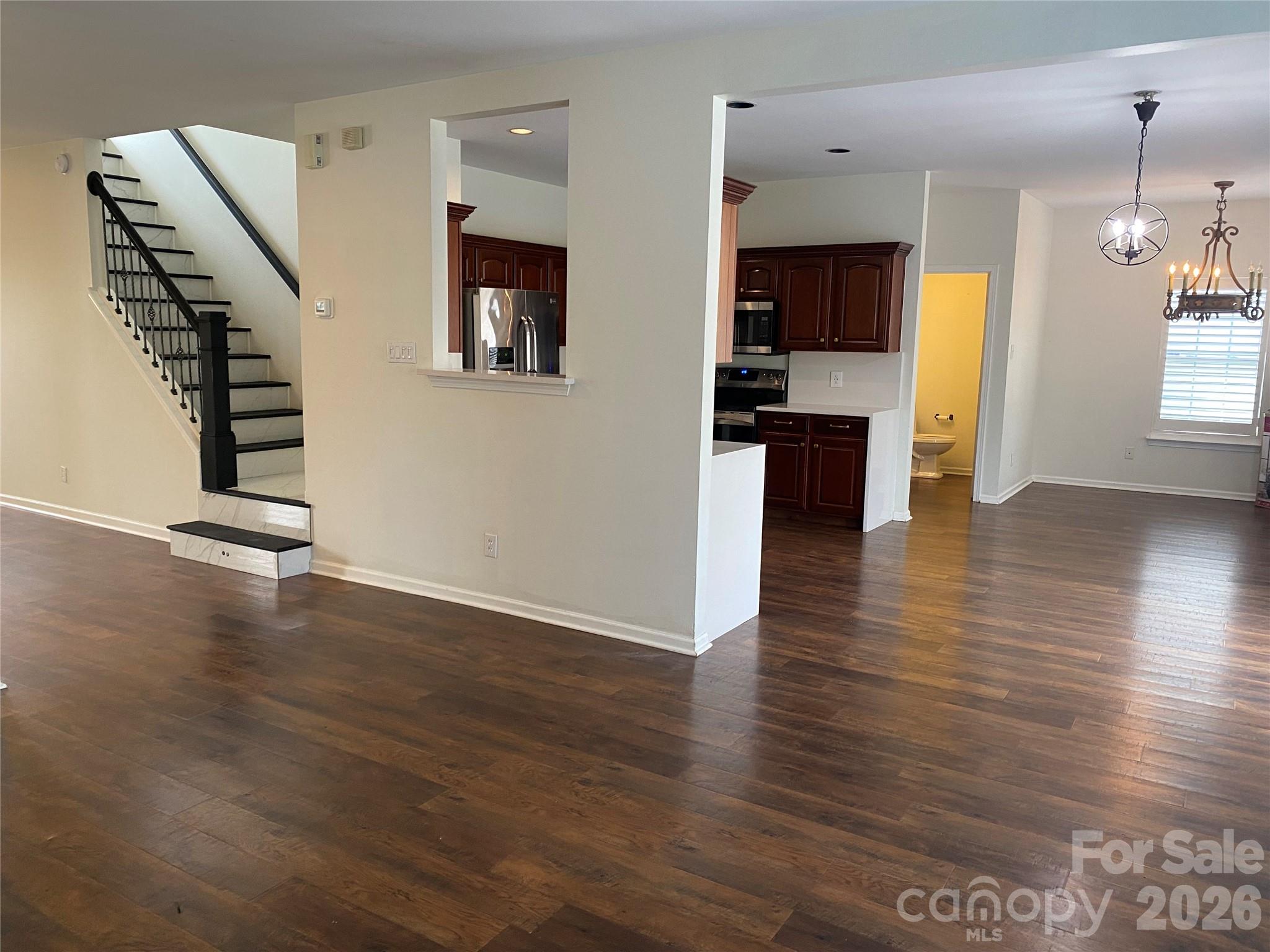 2054 Durand Road Fort Mill, SC 29715 - Photo 6 of 29 an empty room with wooden floor and outdoor view