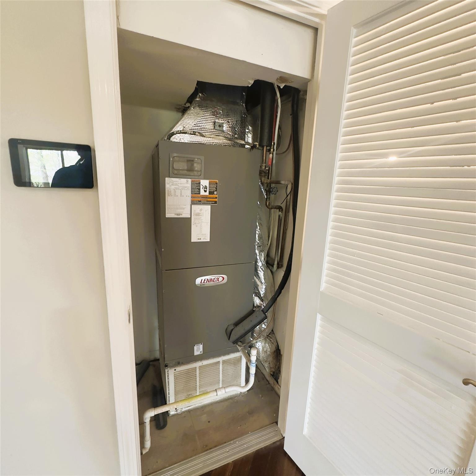 26 Cooper, Unit 603 Poughkeepsie, NY 12603 - Photo 14 of 16 Heating and cooling unit, smart thermostat.