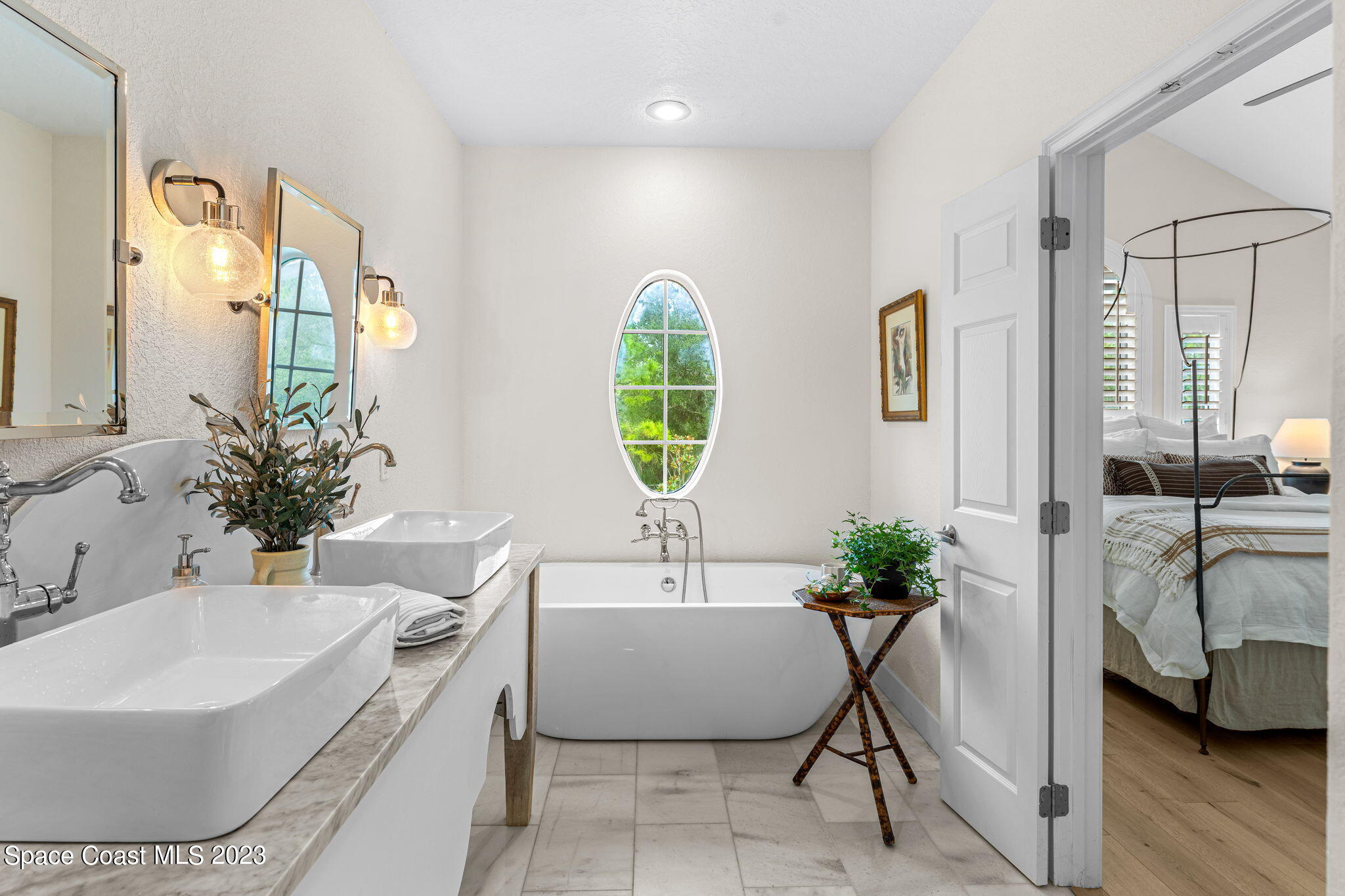 5595 Willoughby Drive Melbourne, FL 32934 - Photo 17 of 40 a living room with furniture and a window