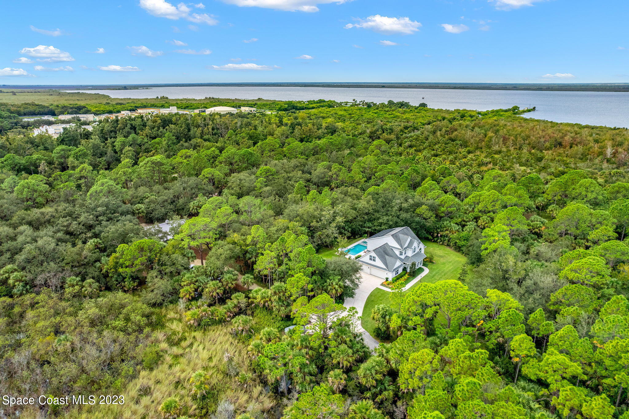 5595 Willoughby Drive Melbourne, FL 32934 - Photo 36 of 40 a view of a yard with an outdoor space