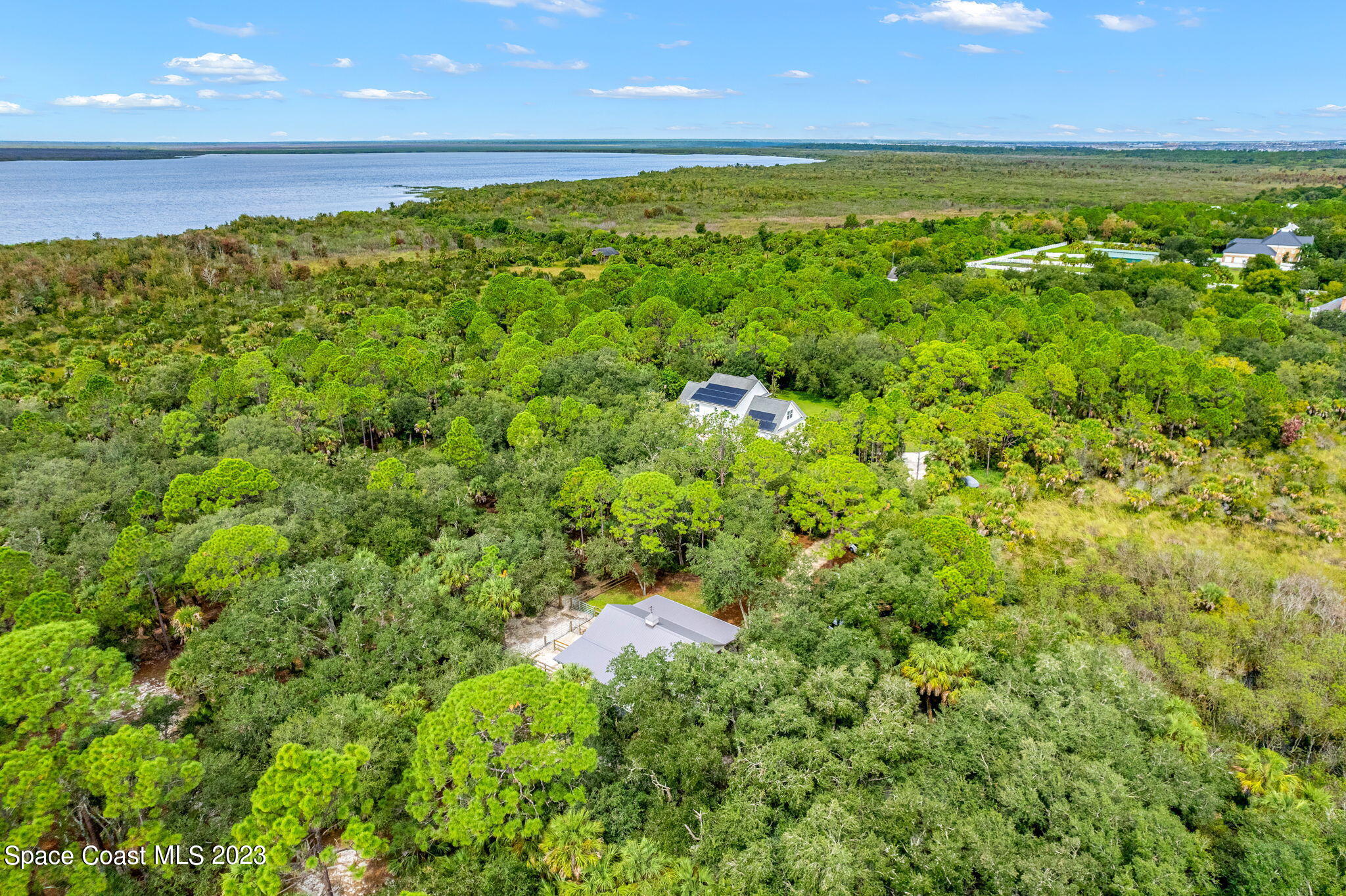 5595 Willoughby Drive Melbourne, FL 32934 - Photo 37 of 40 a view of an outdoor space and a lake view