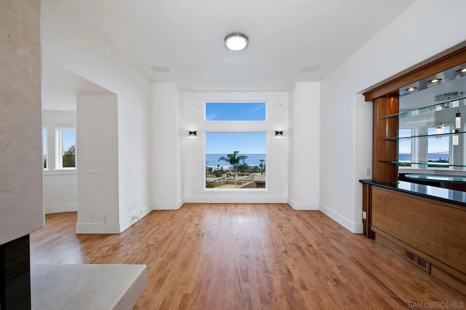 1735 Seaview Avenue Del Mar, CA 92014 - Photo 15 of 51 wooden floor in an empty room with a window