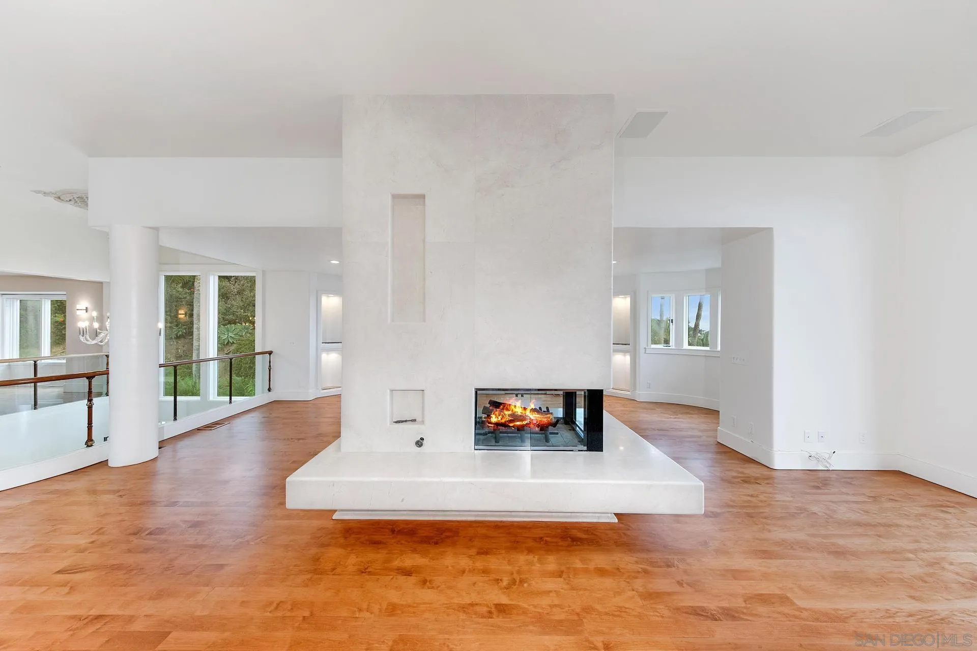 1735 Seaview Avenue Del Mar, CA 92014 - Photo 16 of 51 a living room with furniture and a wooden floor