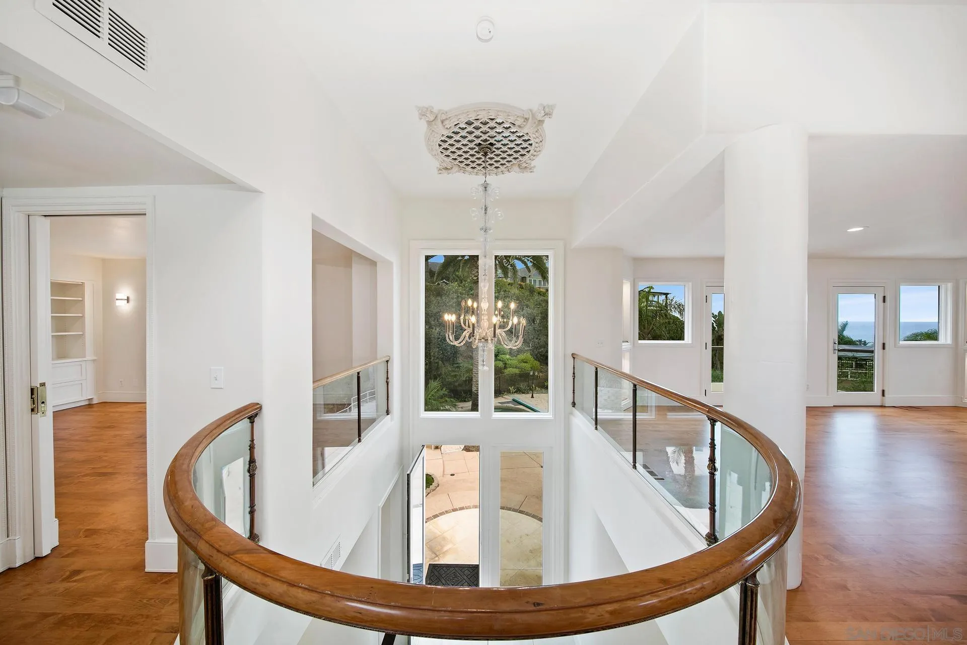 1735 Seaview Avenue Del Mar, CA 92014 - Photo 17 of 51 a view of staircase and living room with a couch