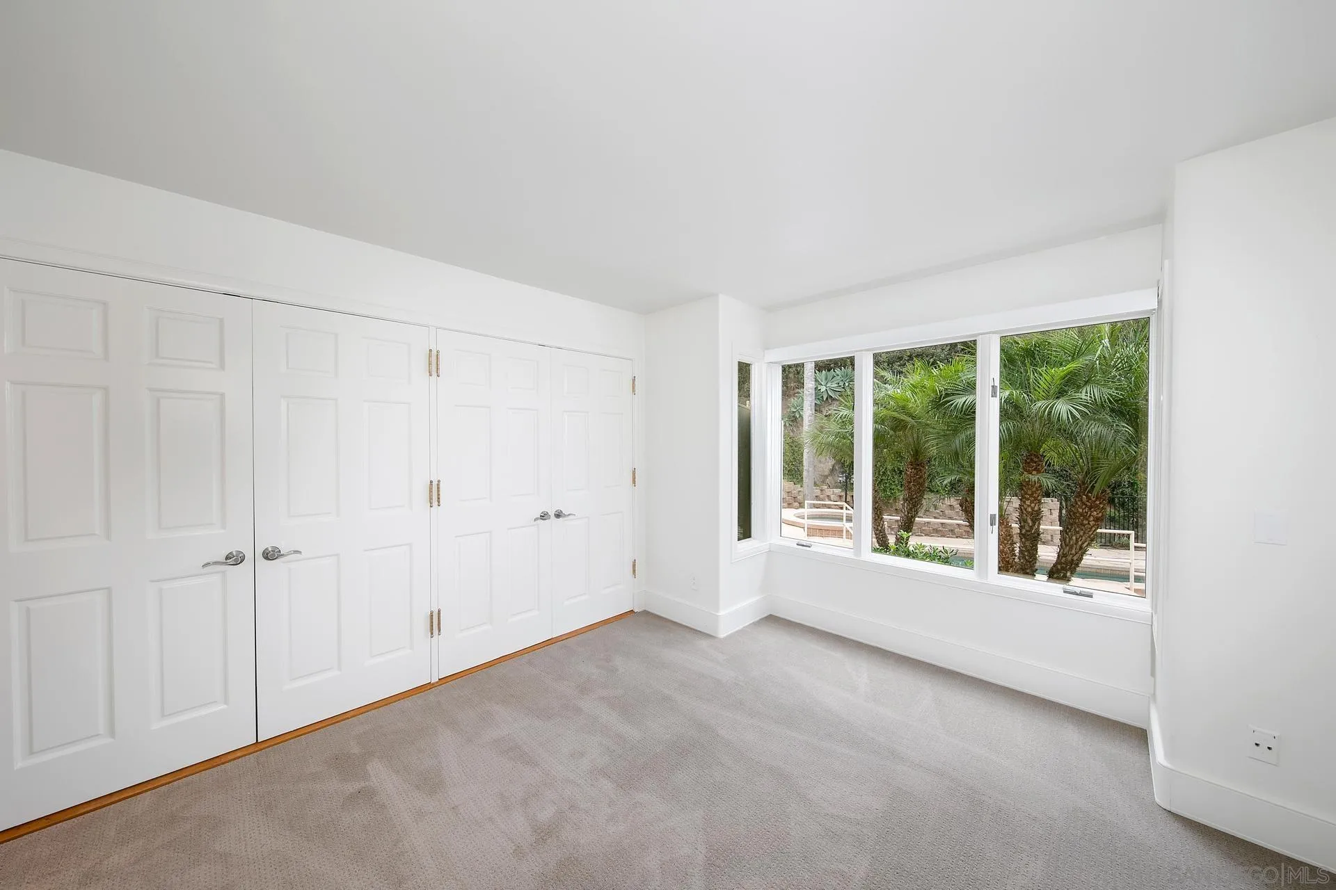 1735 Seaview Avenue Del Mar, CA 92014 - Photo 21 of 51 a view of an empty room with a window