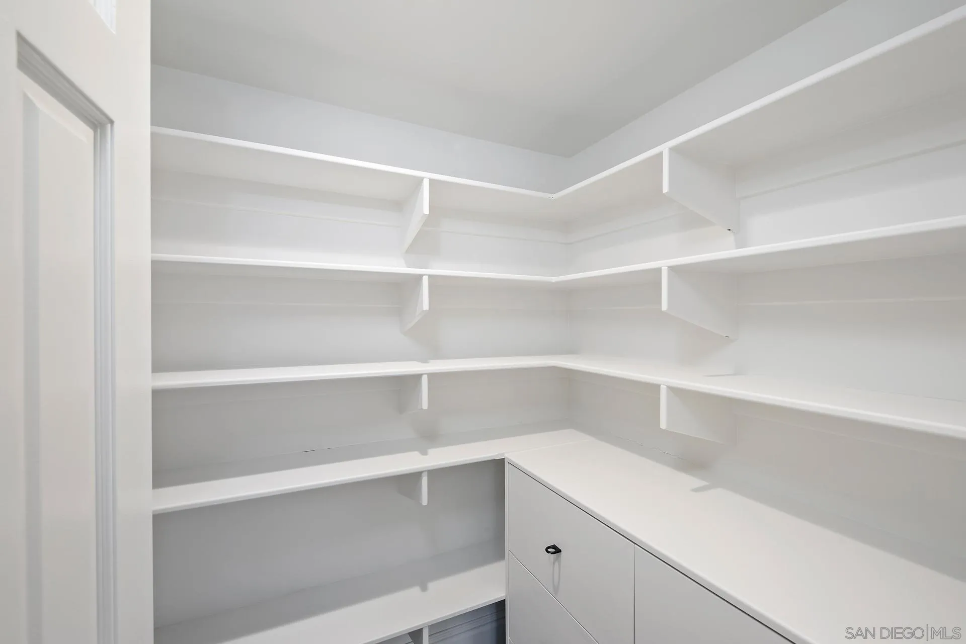 1735 Seaview Avenue Del Mar, CA 92014 - Photo 24 of 51 a view of an empty walk in closet