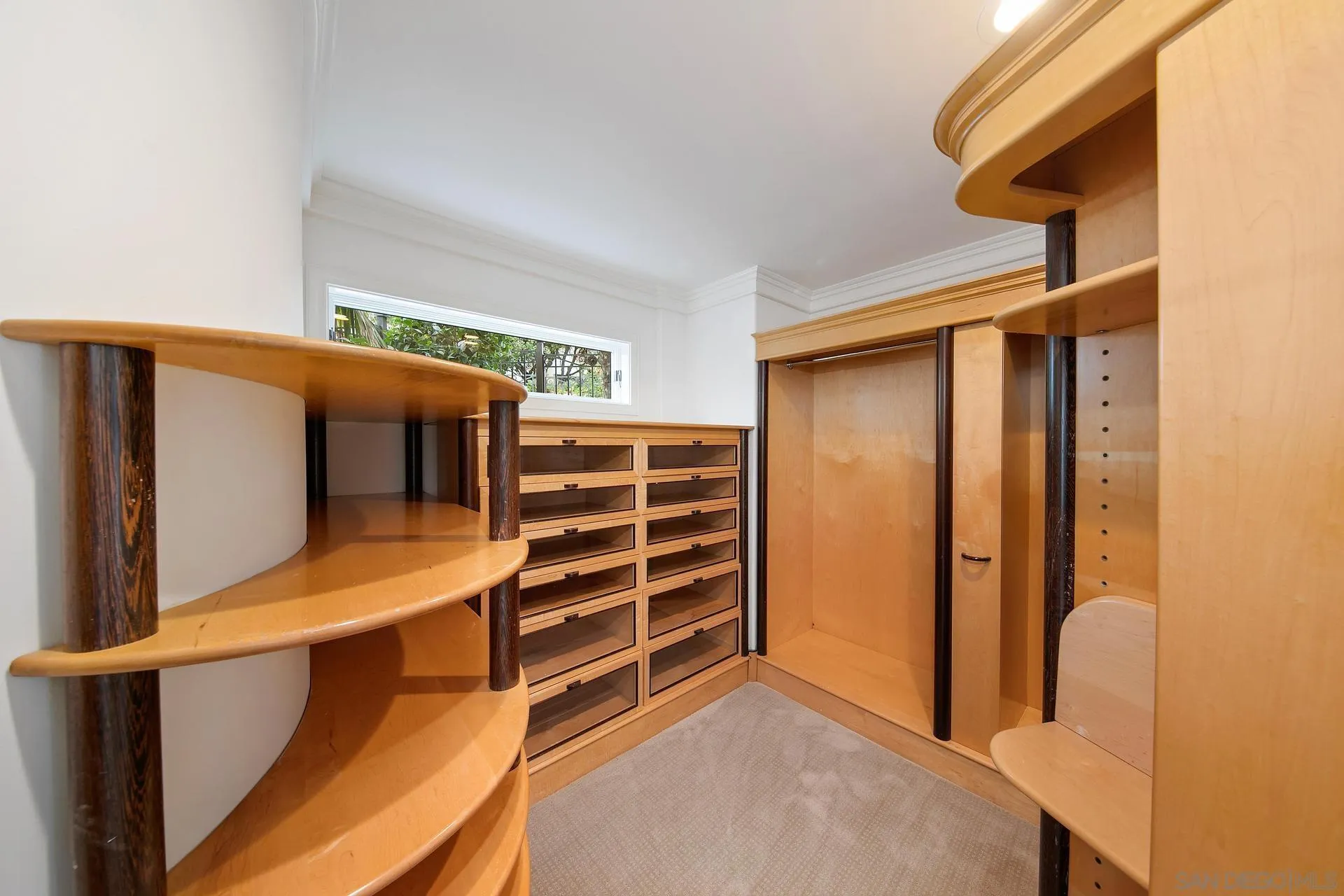 1735 Seaview Avenue Del Mar, CA 92014 - Photo 31 of 51 a view of walk in closet with clothes and shoes