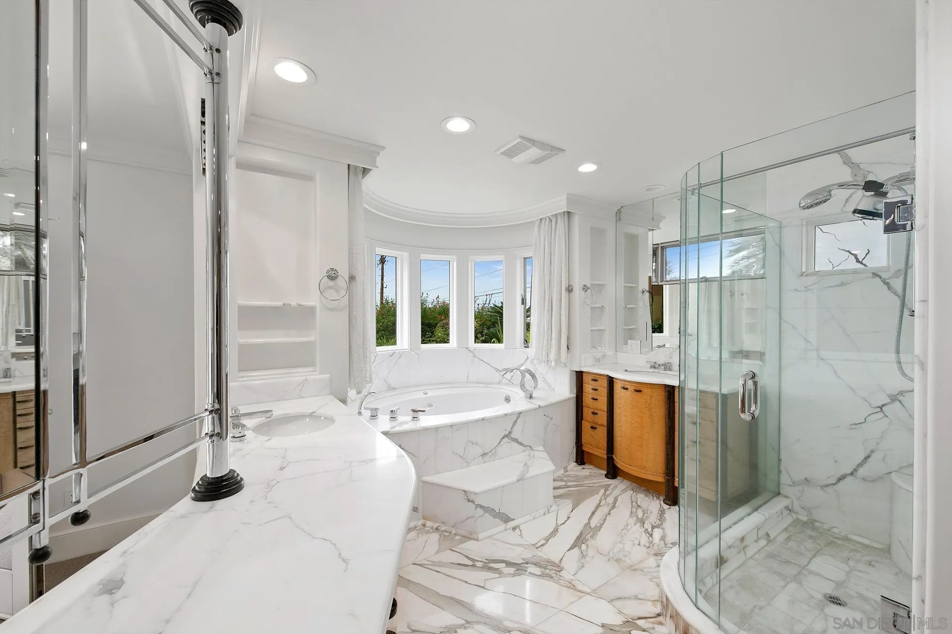1735 Seaview Avenue Del Mar, CA 92014 - Photo 33 of 51 a large bathroom with a tub shower and mirror