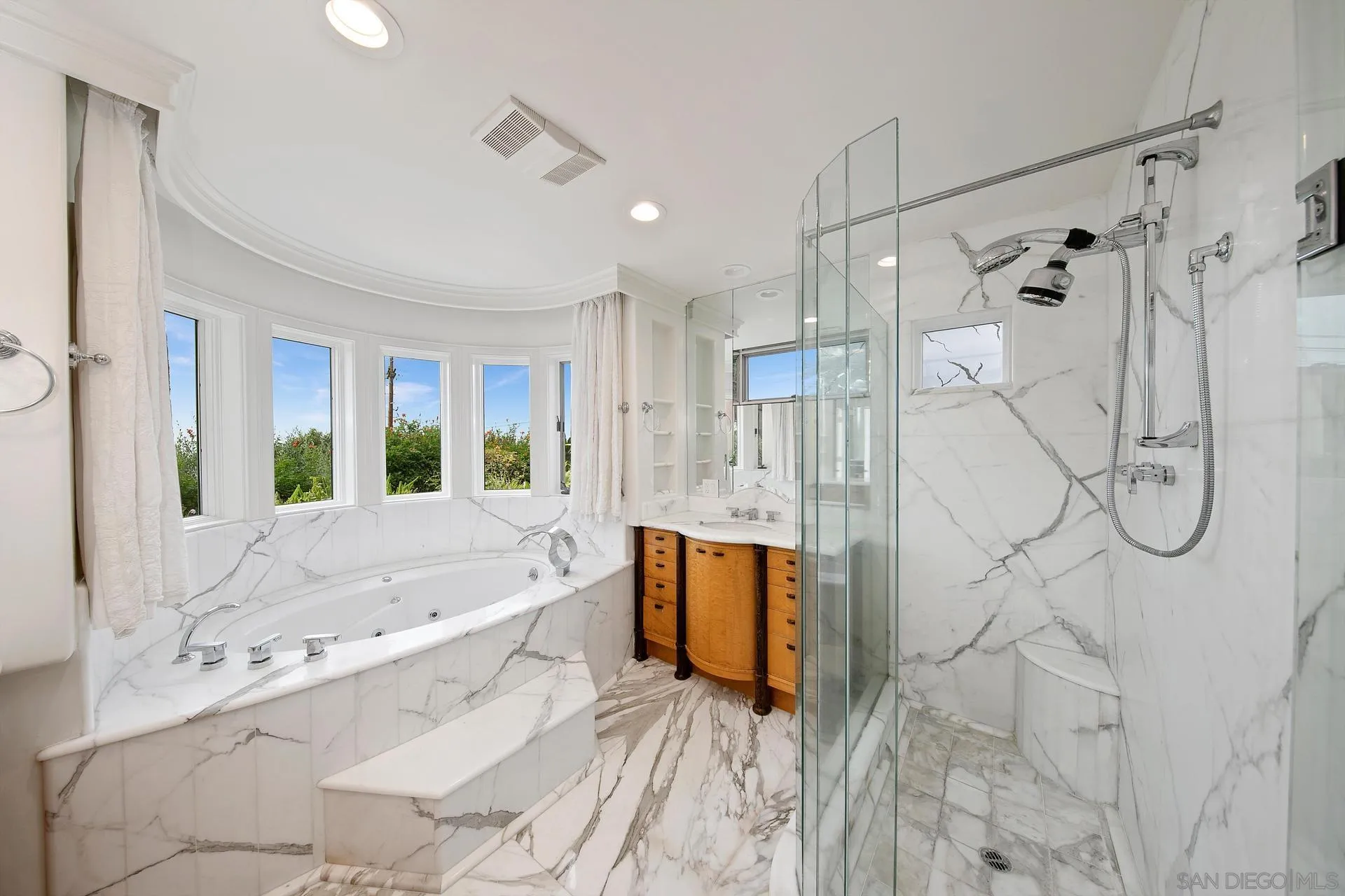1735 Seaview Avenue Del Mar, CA 92014 - Photo 35 of 51 a bathroom with a tub sink and shower