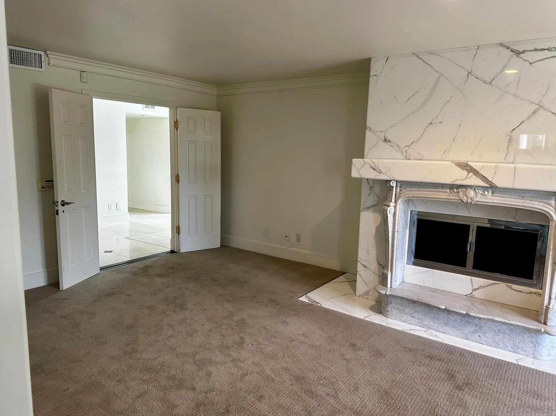 1735 Seaview Avenue Del Mar, CA 92014 - Photo 39 of 51 a view of an empty room with a fireplace