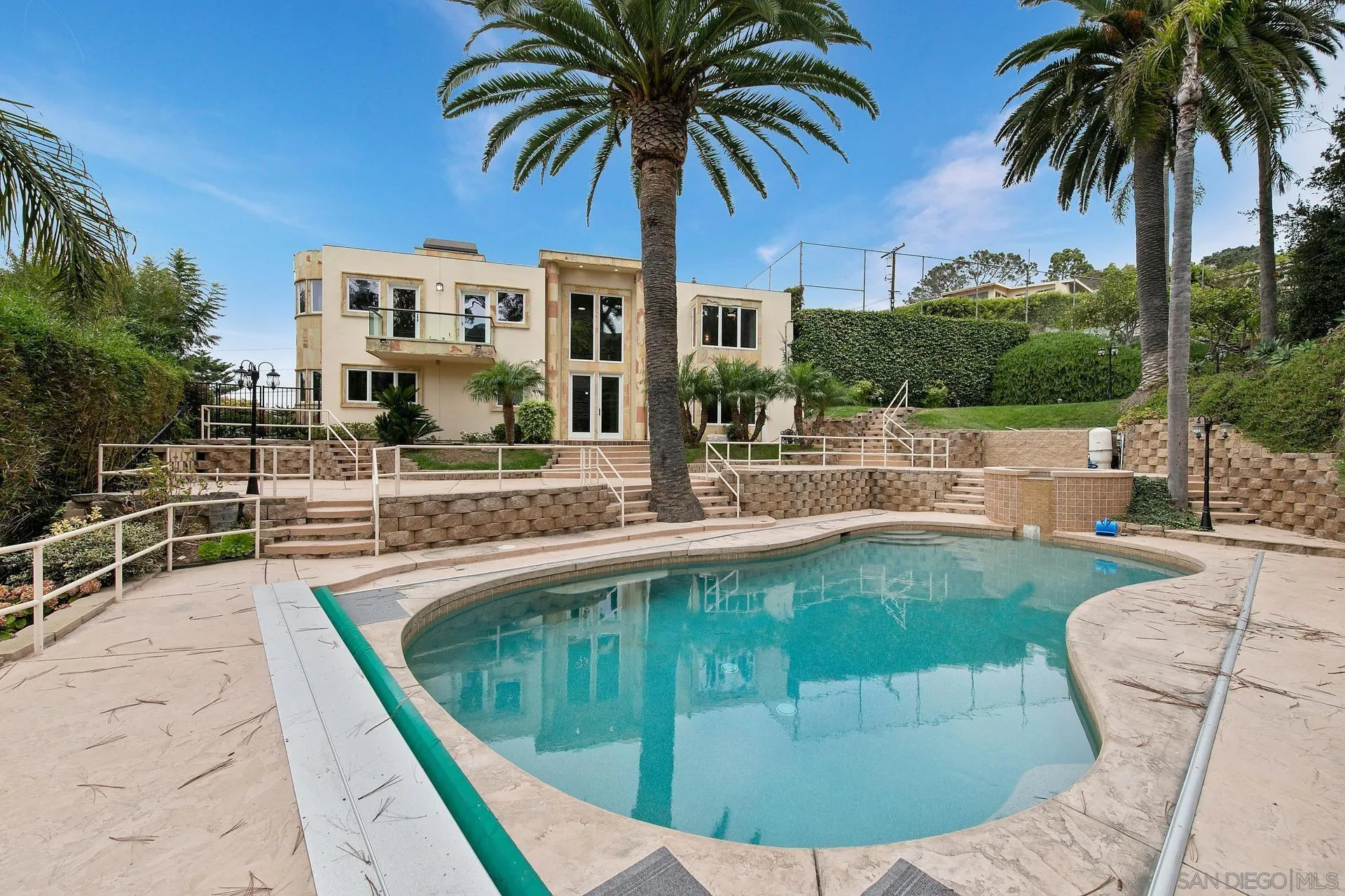 1735 Seaview Avenue Del Mar, CA 92014 - Photo 42 of 51 a view of a swimming pool with a patio