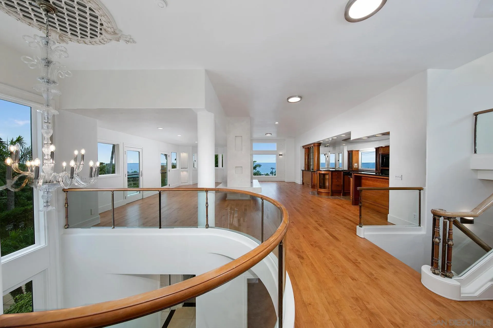 1735 Seaview Avenue Del Mar, CA 92014 - Photo 10 of 51 a living room with furniture and a wooden floor