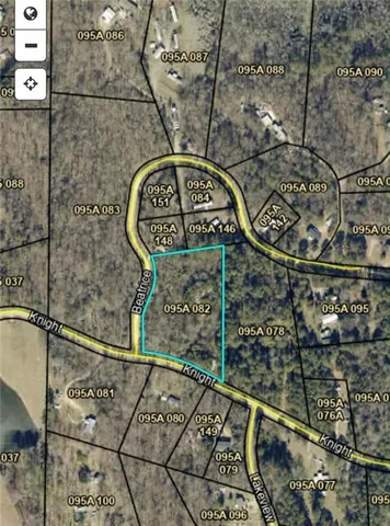 a sign on a wall next to a road