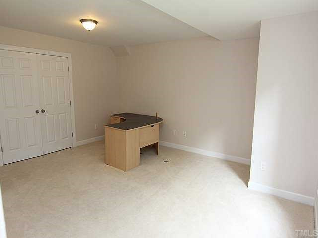 5204 6 Pence Court Raleigh, NC 27613 - Photo 11 of 17 Large room can be used as a home office or another bedroom. Basement