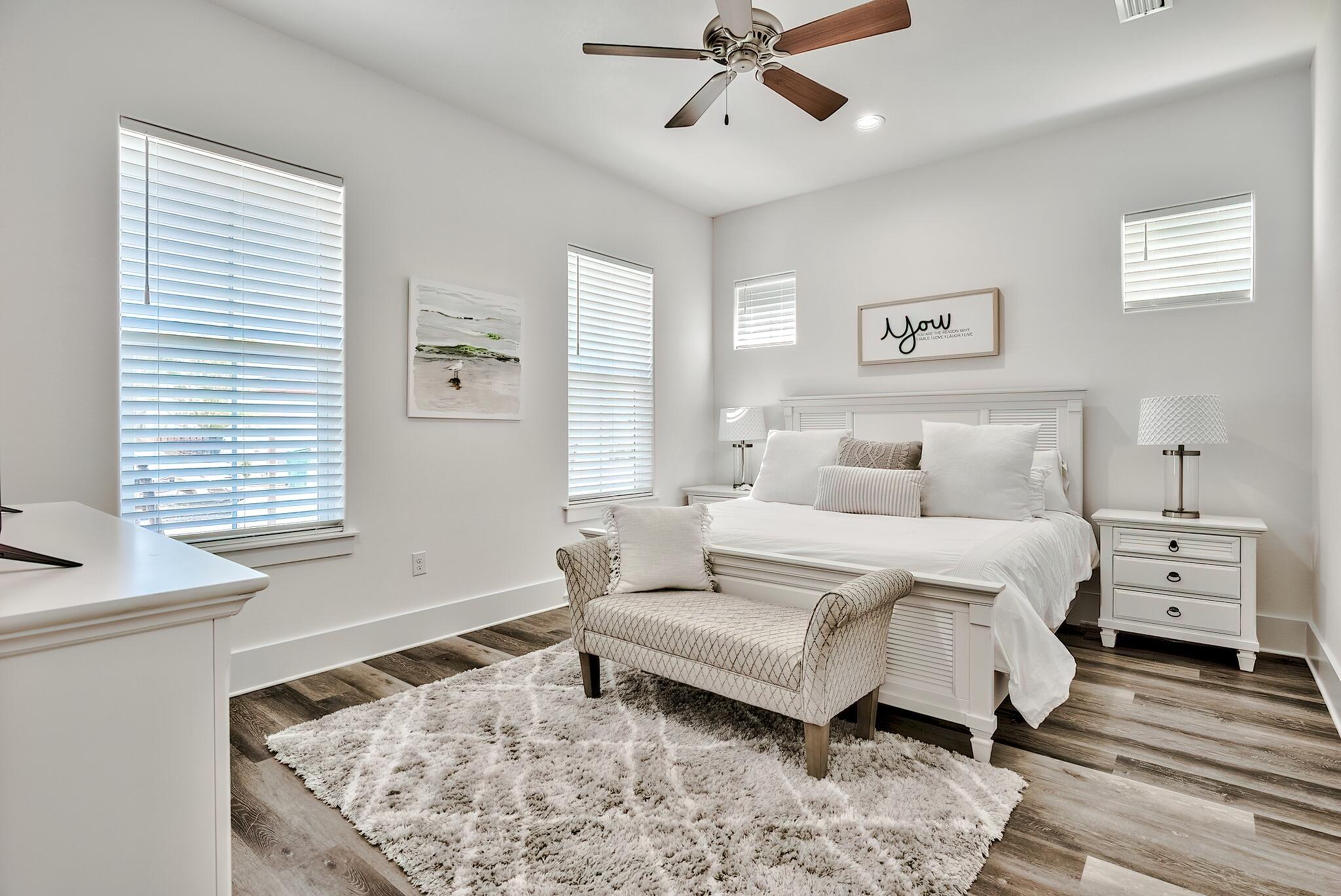 61 Carefree Lane Santa Rosa Beach, FL 32459 - Photo 12 of 30 a spacious bedroom with a bed and a window