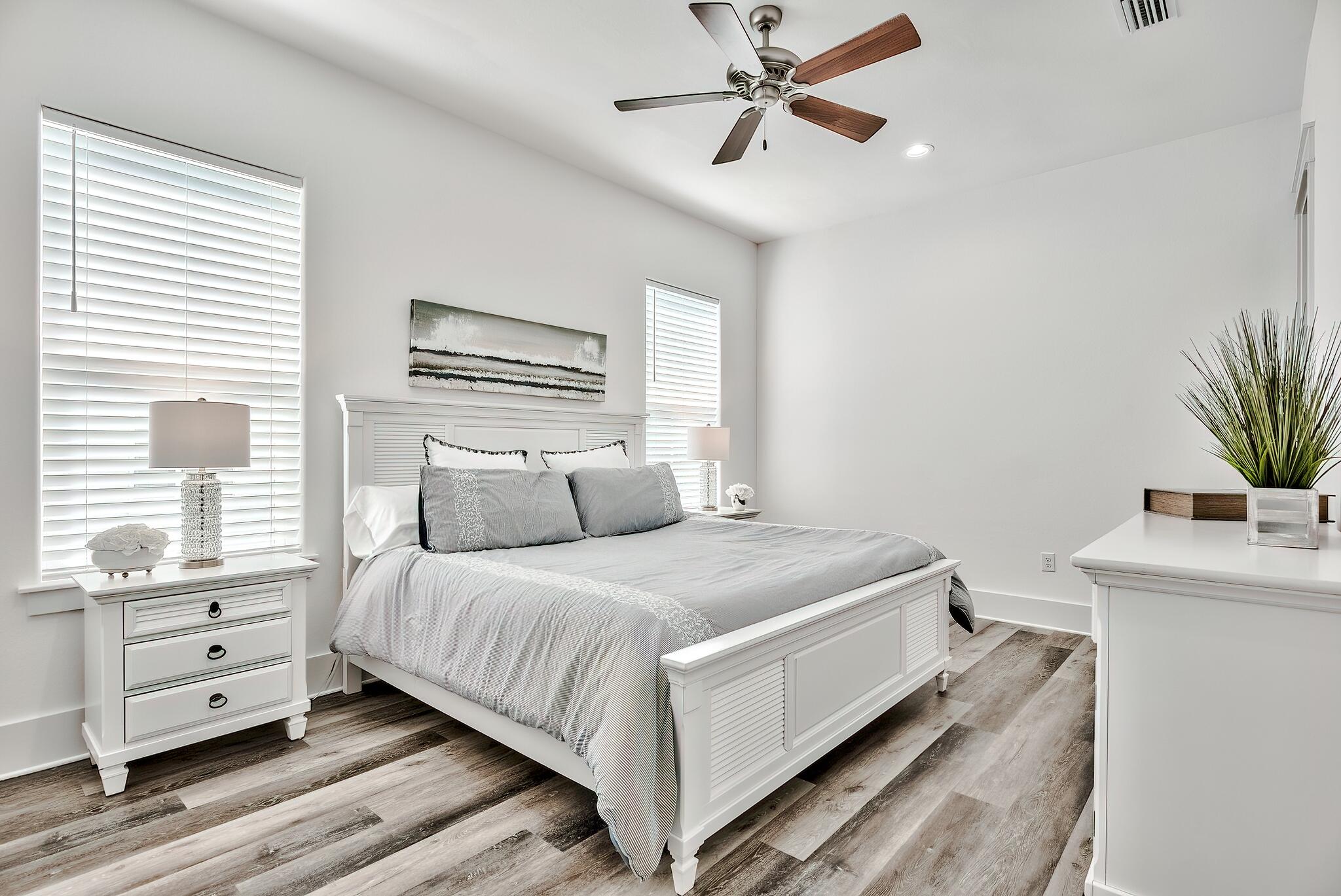 61 Carefree Lane Santa Rosa Beach, FL 32459 - Photo 17 of 30 a bedroom with a bed and a window