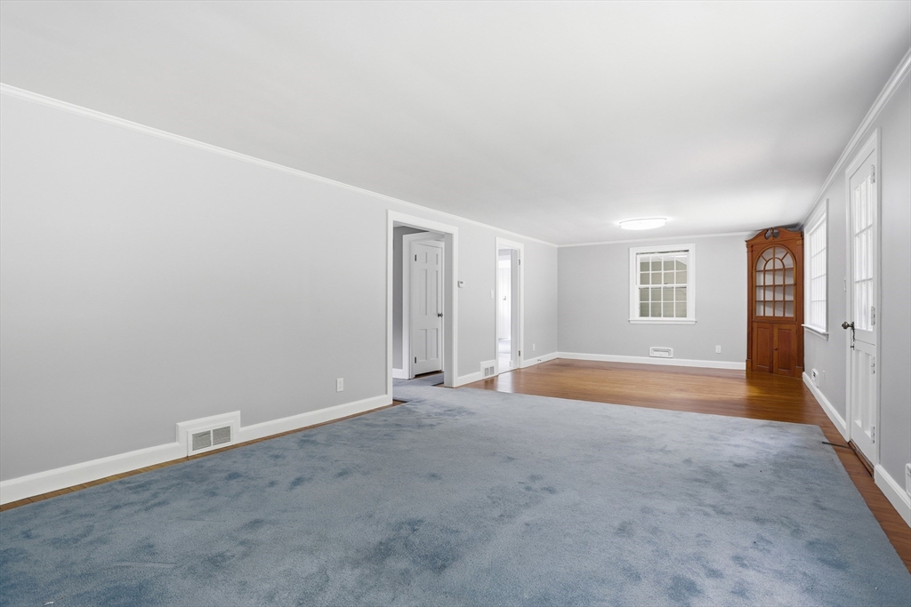 11 Sherman's Bridge Road Wayland, MA 01778 - Photo 16 of 38 an empty room with windows