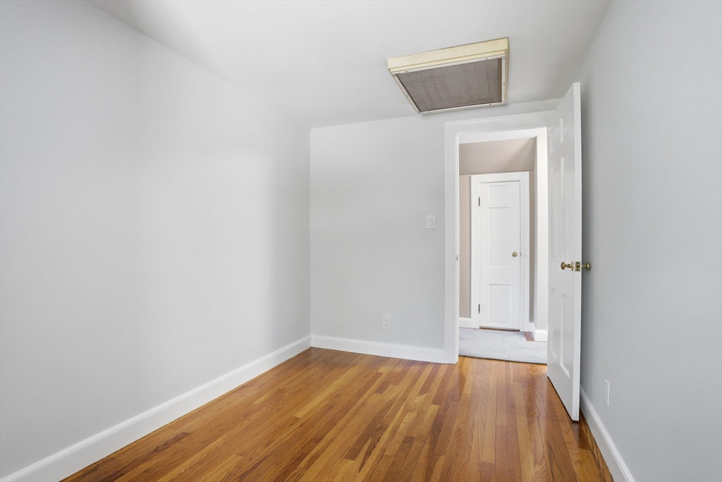 11 Sherman's Bridge Road Wayland, MA 01778 - Photo 27 of 38 a view of a small space with wooden floor and a hallway