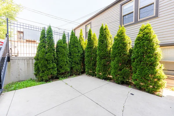 a view of balcony with yard