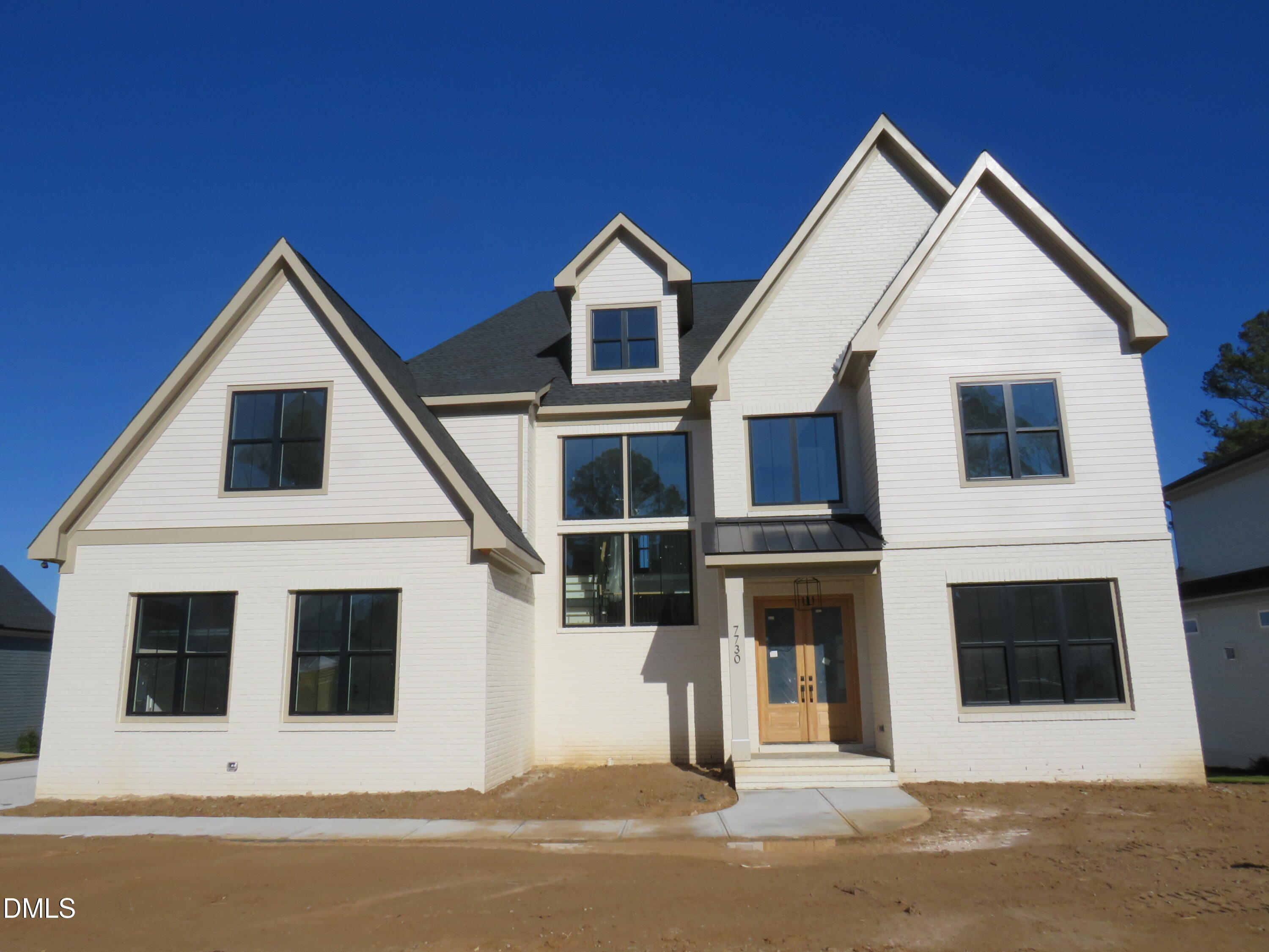 7730 Roberts Road Apex, NC 27523 - Photo 1 of 3 a view of a house with a yard
