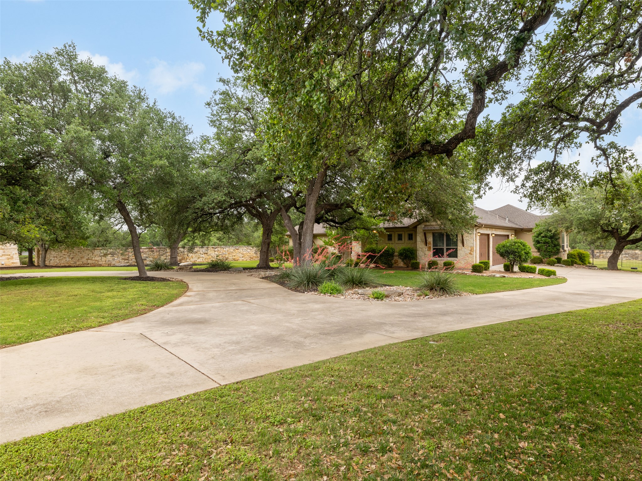 101 Aldea Street Georgetown, TX 78633 - Photo 26 of 40 If you enjoy hosting for the holidays, a ton of cars could easily park all along the driveway and circle drive!