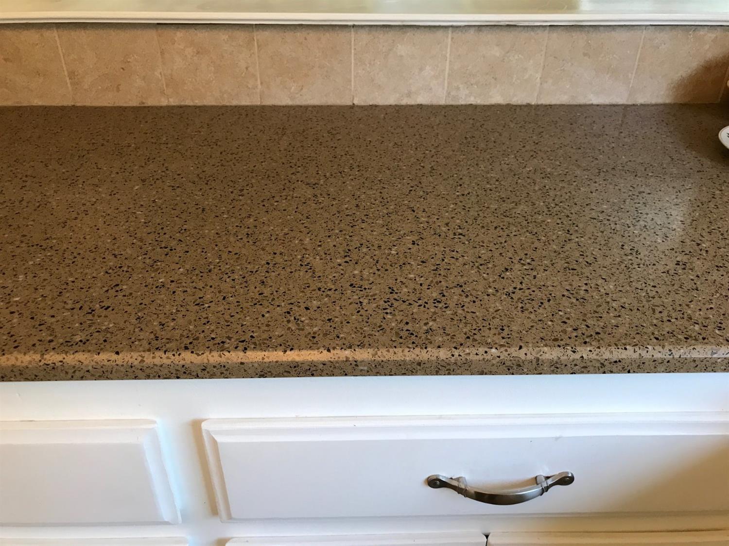 695 Monroe Street Coalinga, CA 93210 - Photo 24 of 60 Countertop surface in the kitchen.
