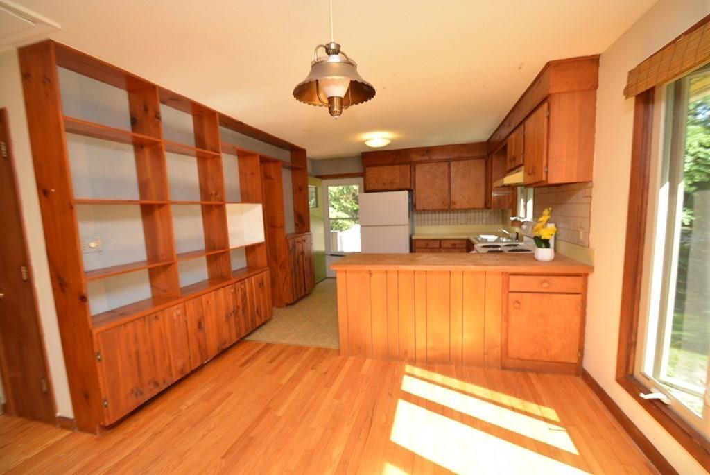 442 Warren Wright Road Belchertown, MA 01007 - Photo 14 of 35 a view of kitchen with wooden floor and electronic appliances