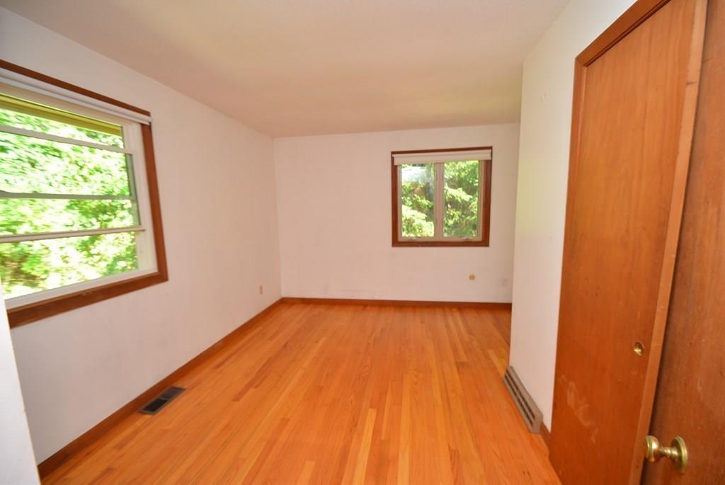 442 Warren Wright Road Belchertown, MA 01007 - Photo 16 of 35 a view of a room with wooden floor and natural light