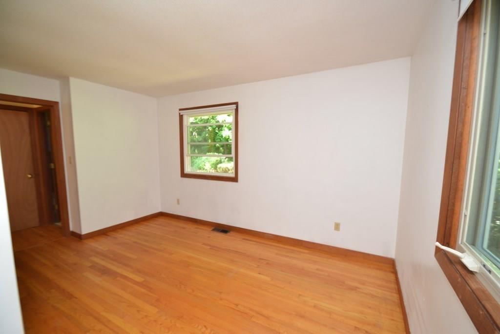 442 Warren Wright Road Belchertown, MA 01007 - Photo 17 of 35 an empty room with windows
