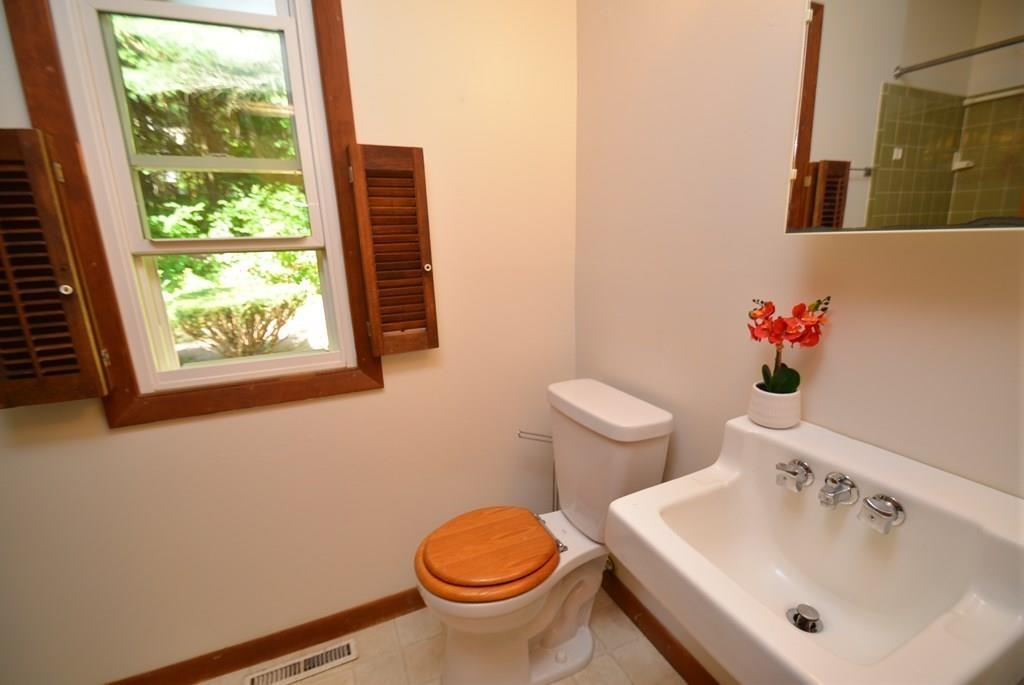 442 Warren Wright Road Belchertown, MA 01007 - Photo 18 of 35 a bathroom with a sink and a toilet