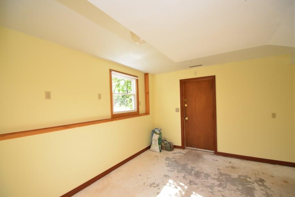 442 Warren Wright Road Belchertown, MA 01007 - Photo 20 of 35 a view of an empty room with a window