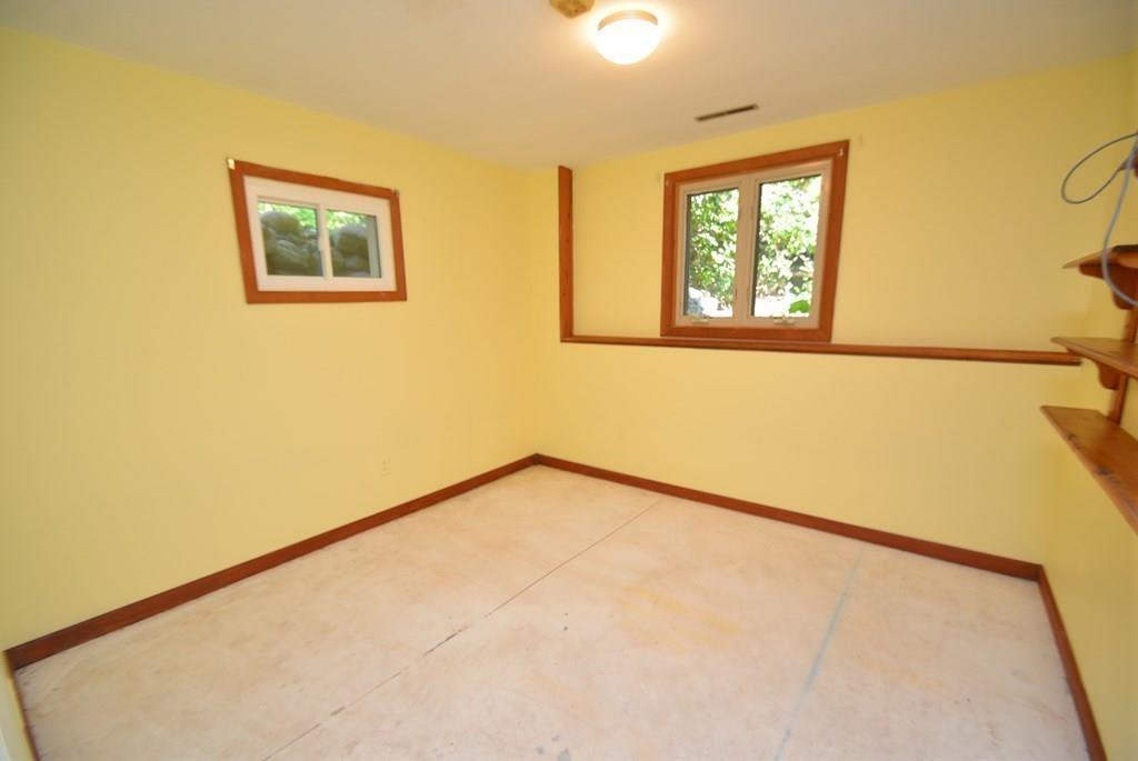 442 Warren Wright Road Belchertown, MA 01007 - Photo 22 of 35 a view of an empty room with a window