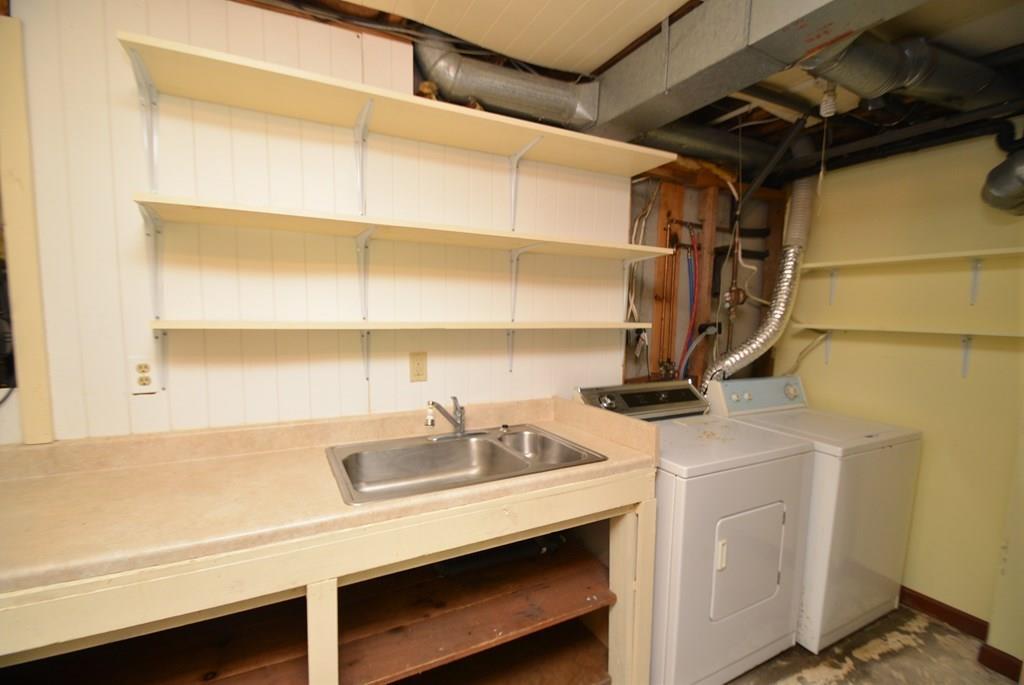 442 Warren Wright Road Belchertown, MA 01007 - Photo 25 of 35 a kitchen with a sink a stove and a window