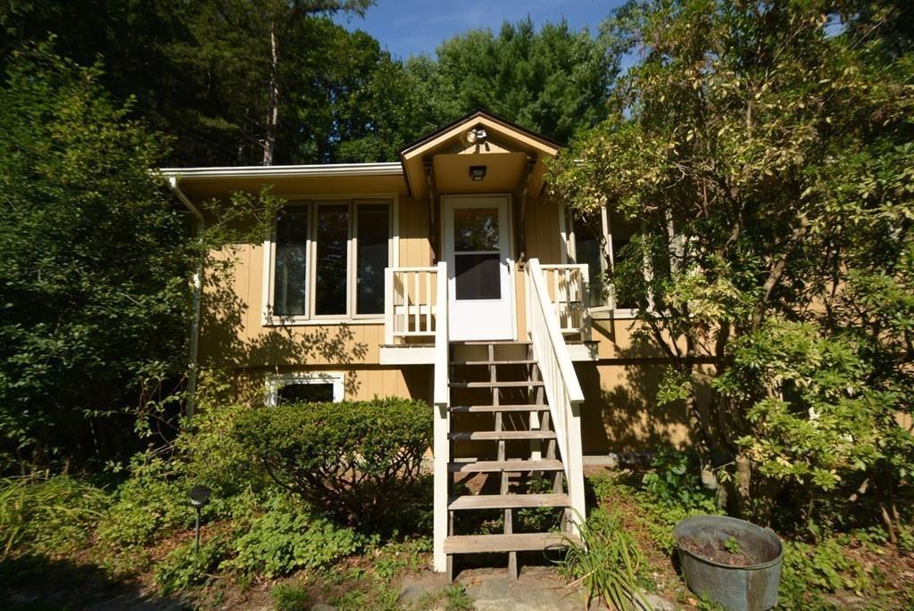442 Warren Wright Road Belchertown, MA 01007 - Photo 27 of 35 a front view of a house with a yard