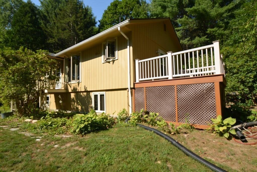 442 Warren Wright Road Belchertown, MA 01007 - Photo 29 of 35 a view of a house with a yard
