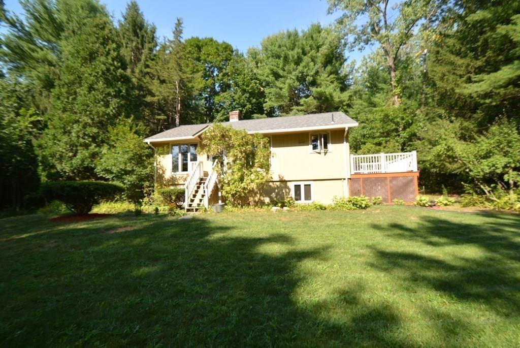 442 Warren Wright Road Belchertown, MA 01007 - Photo 30 of 35 a view of a back yard of the house