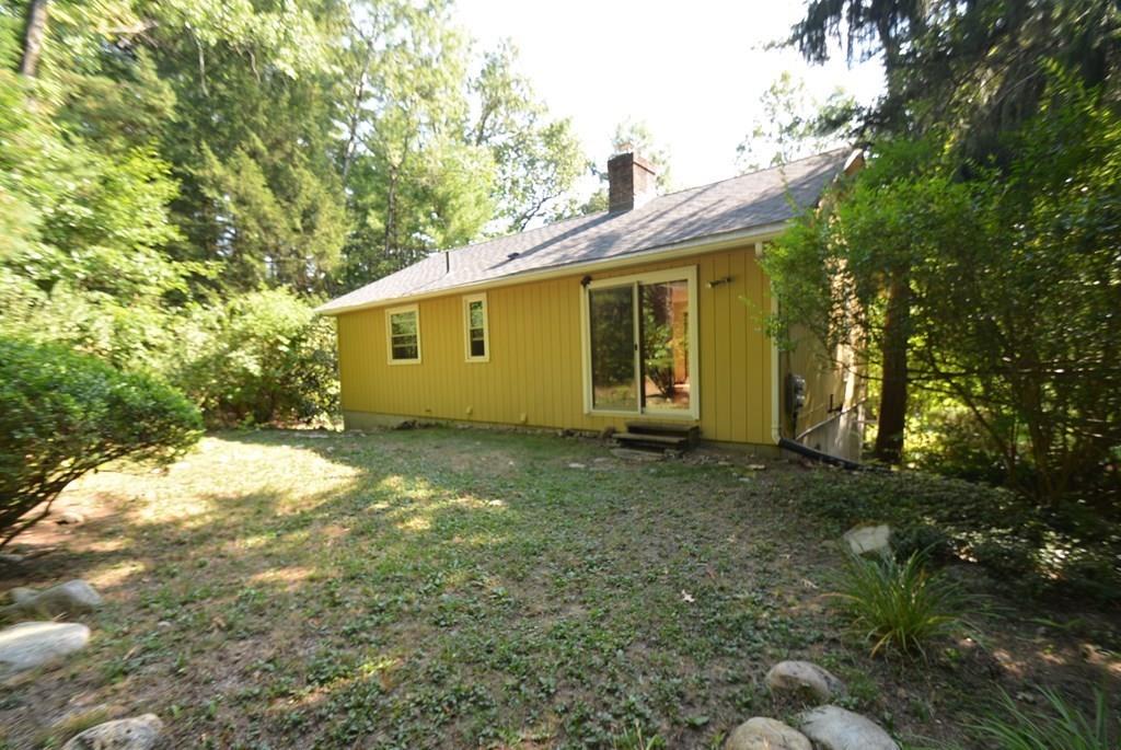 442 Warren Wright Road Belchertown, MA 01007 - Photo 34 of 35 a view of a house with a yard