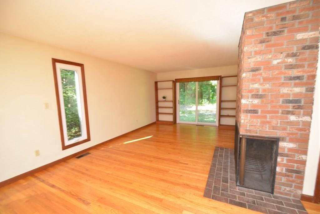 442 Warren Wright Road Belchertown, MA 01007 - Photo 6 of 35 a view of an empty room with a window