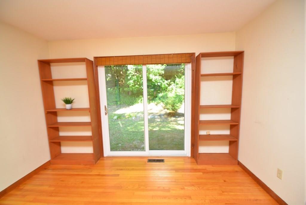 442 Warren Wright Road Belchertown, MA 01007 - Photo 9 of 35 a view of an empty room with a window
