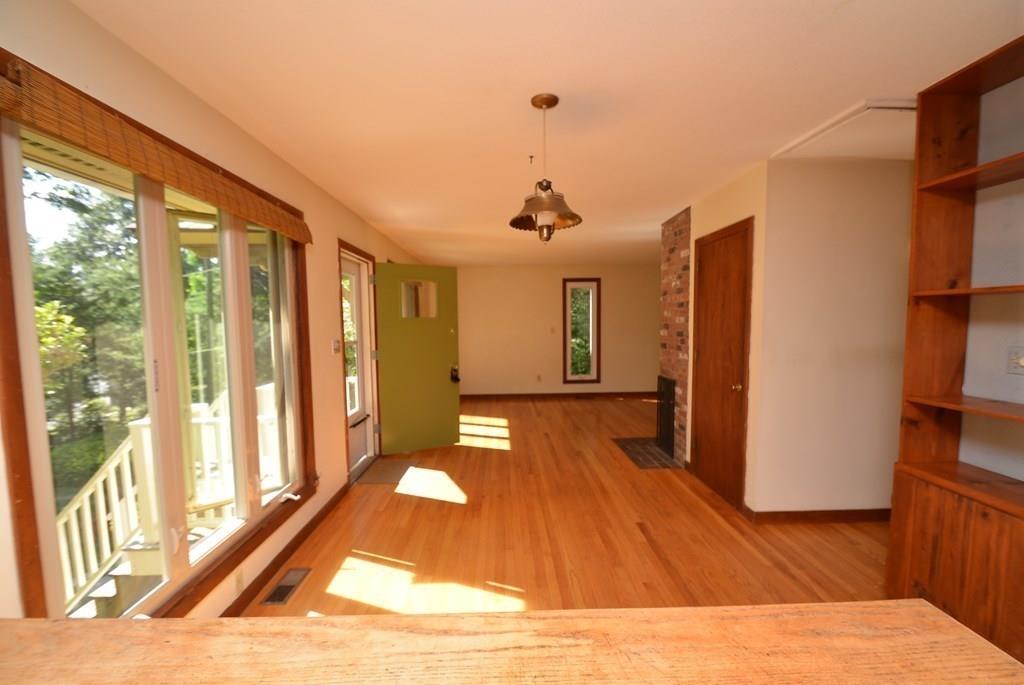 442 Warren Wright Road Belchertown, MA 01007 - Photo 10 of 35 a view of a living room with furniture and a large window