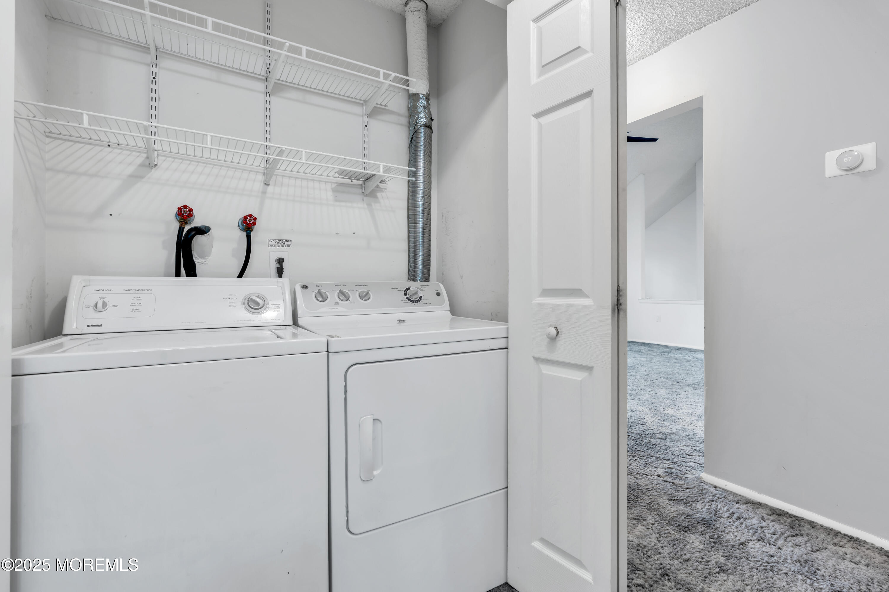 705 Bluebell Drive Jackson, NJ 08527 - Photo 29 of 44 a utility room with dryer and washer