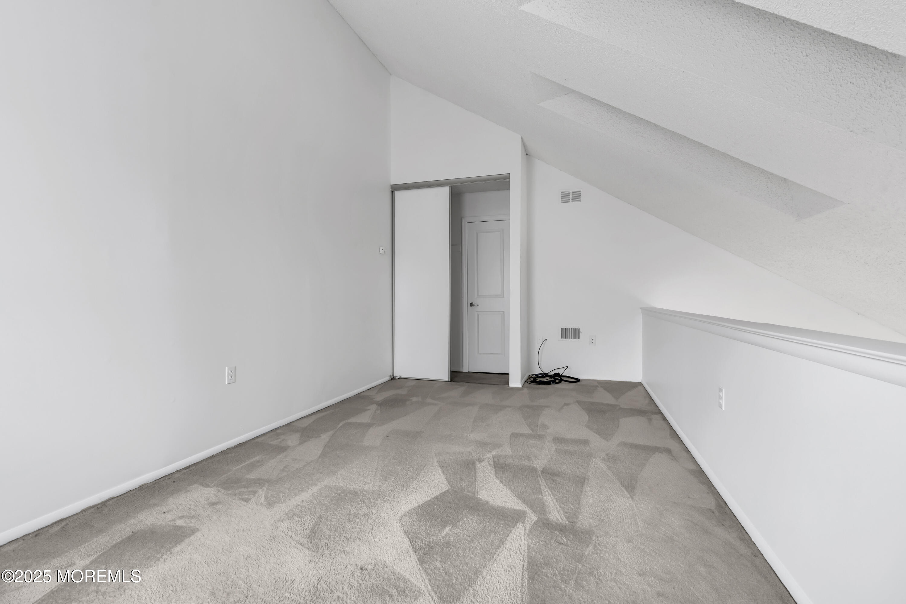 705 Bluebell Drive Jackson, NJ 08527 - Photo 30 of 44 a view of an empty room with closet area