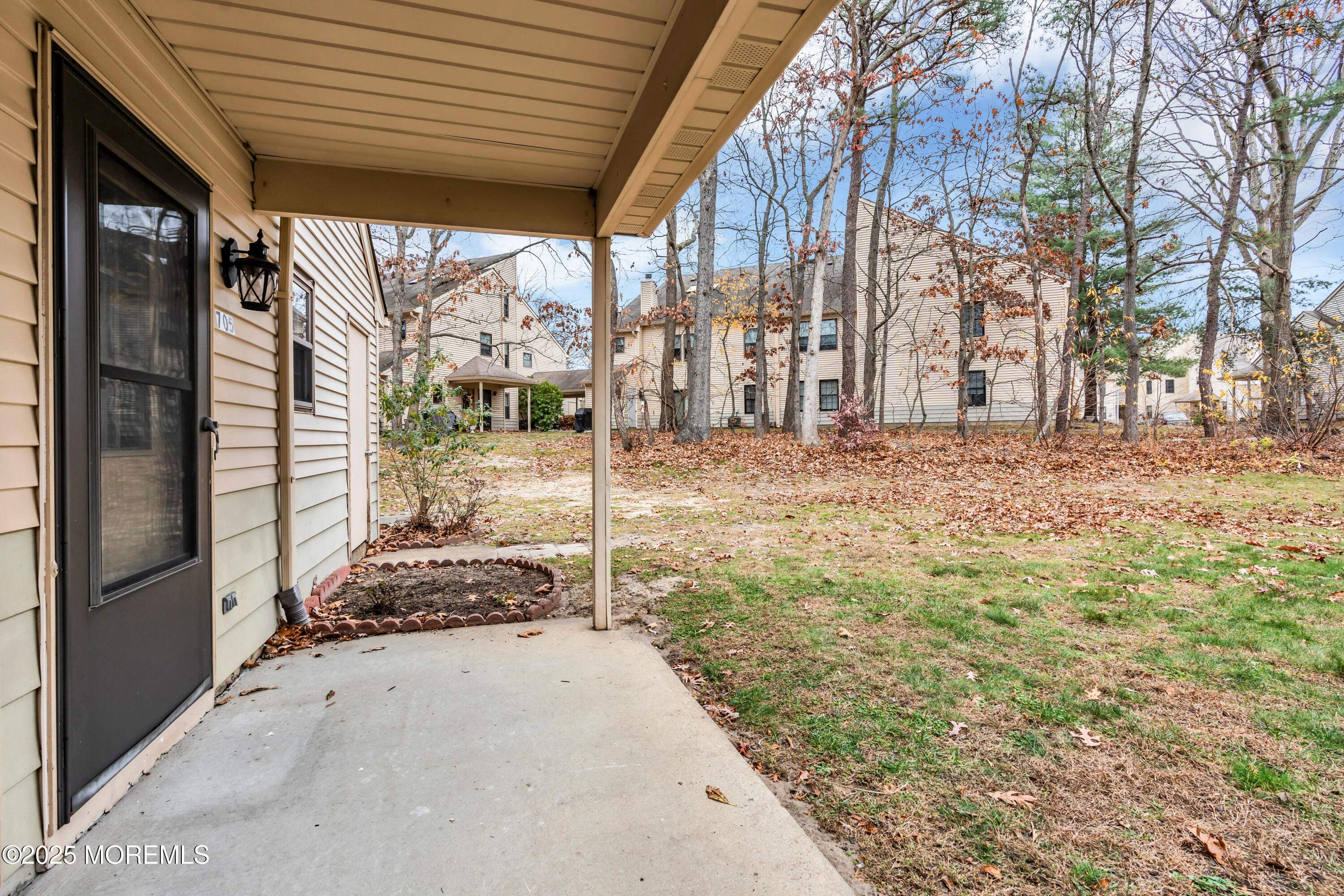 705 Bluebell Drive Jackson, NJ 08527 - Photo 37 of 44 a view of a backyard of the house