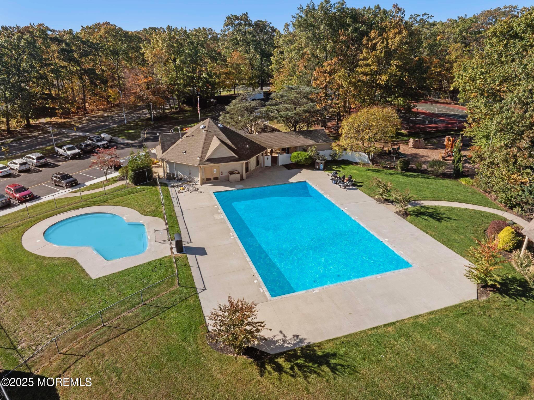 705 Bluebell Drive Jackson, NJ 08527 - Photo 38 of 44 an aerial view of a house with a swimming pool