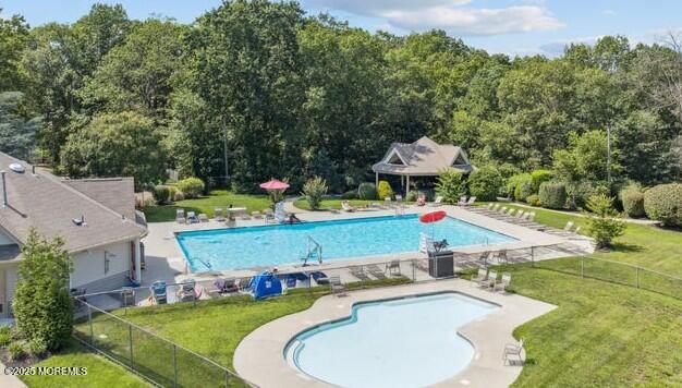 705 Bluebell Drive Jackson, NJ 08527 - Photo 44 of 44 an aerial view of a house with swimming pool and trees