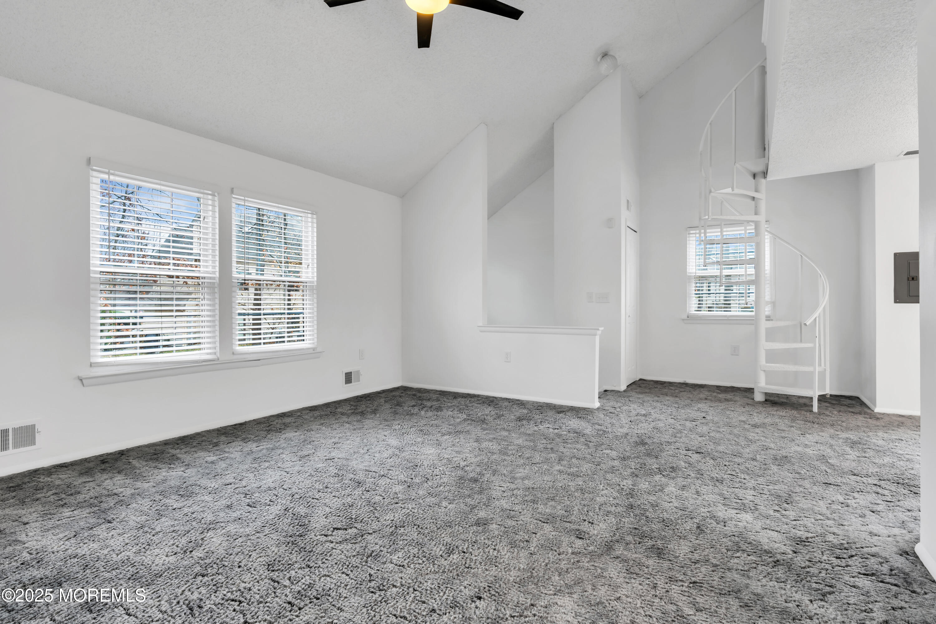 705 Bluebell Drive Jackson, NJ 08527 - Photo 8 of 44 an empty room with windows